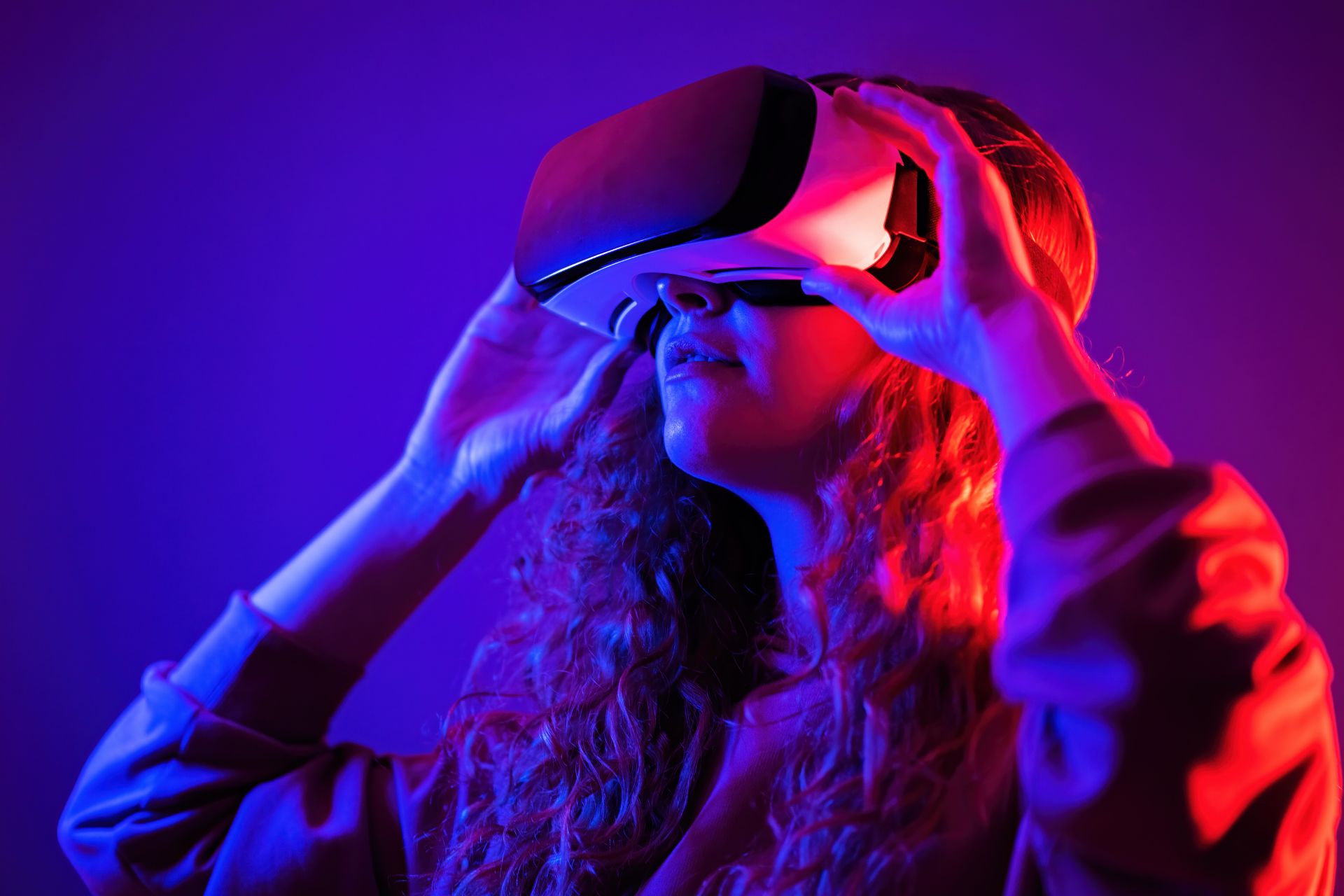 a photo of a person wearing a virtual reality headset